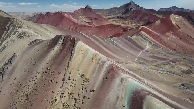 Vinicunca, Peru - Rainbow Mountain (5200 m) in Andes, Cordillera de los Andes, Cusco region in South America. (aerial view)