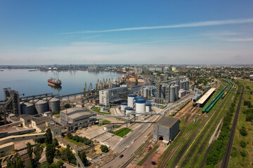 Bulk Terminal of port Mykolaiv and city view from sky