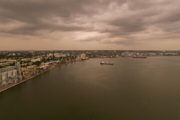 Fototapeta premium Bulk Terminal of port Mykolaiv and city view from sky