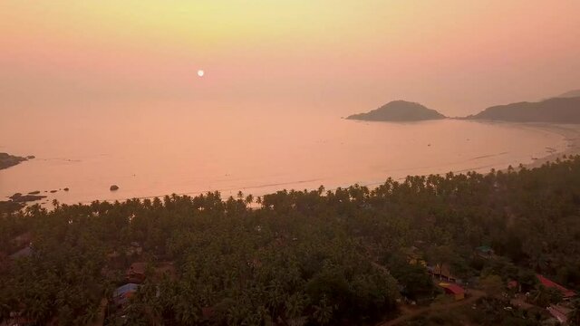 Aerial view of beautiful sunset on tropical Goa beach, Palolem beach, India. Goa, Palolem beach, India. It is one of the most popular resorts in India.