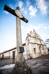 Christian cross at the entrance of the local church. Church of Santa Ana. Magnificent colonial church. Niquinohomo, Nicaragua.