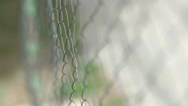 Wire safety fence of a prison, closeup