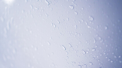 A view of a soapy windshield from inside of a car at the carwash