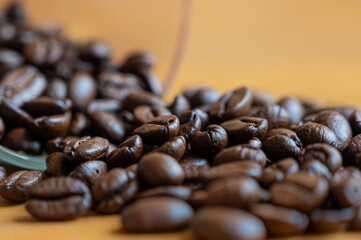 close coffee beans on wood table