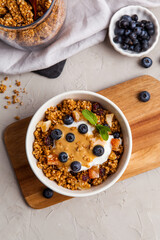 Yogurt bowl with homemade granola and fresh berries. Healthy eating.  - 441646820