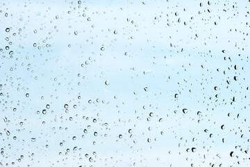 Raindrops on the window pane. Background for the inscription
