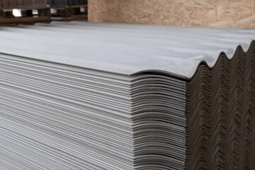 Row of Toxic Dangerous cancer risk Eternit Asbestos Cement Roof Sheet, building material at store,...