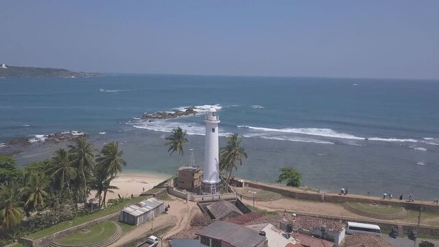 White lighthouse and Meeran Jumma Masjid mosque in old Dutch Galle fort, Sri Lanka (aerial photography)
