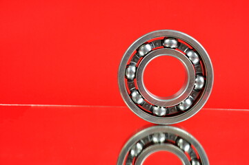 Ball bearing on a mirror surface. Spare parts.