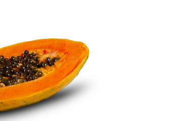 Half Cut of Fresh Ripe Papaya isolated on white background. Selective focus.