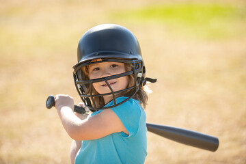 Little boy posing with a baseball bat. Portrait of kid playing baseball.