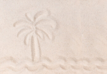 wave and palm drawing on the sand