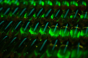green capsules under darkness lighting