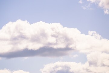 Fototapeta na wymiar White cumulus clouds in blue sky.