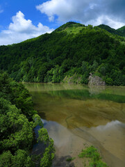 Fototapeta na wymiar Malaia Dam lake in the Carpathians, Romania, Europe