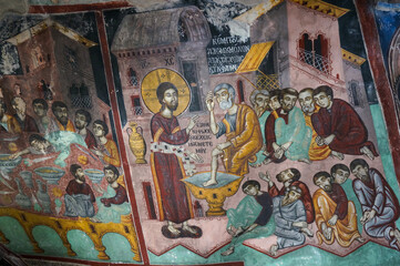 Fototapeta na wymiar Fresco on the wall in the cave. Saint Neophytos (Agios Neophytos) Monastery, Cyprus.