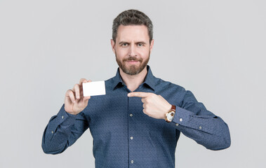 businessman demonstrating credit or debit card. empty plastic business name card.