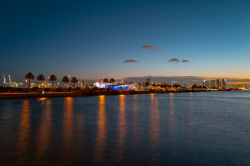 Fototapeta premium Miami at sunset. Miami Florida, colorful skyline of Macarthur causeway.