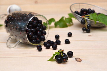 scattered berries currants on a wooden background
