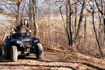 Couple Driving Off-road With Quad Bike or Atv