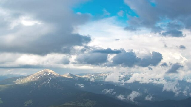Mount Hoverla in the Ukrainian carpathians in fog and clouds in summer, timelapse