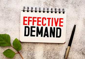 Business concept. text Effective Demand on white paper