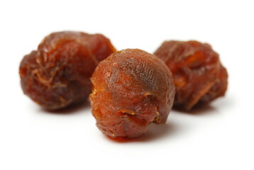 Dried Longans on white background 