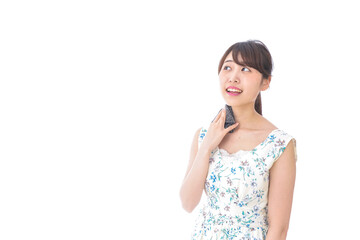 Fototapeta premium 手のアルコール消毒をする若い女性