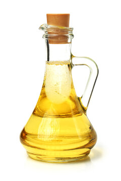 a bottle of olive oil on white background