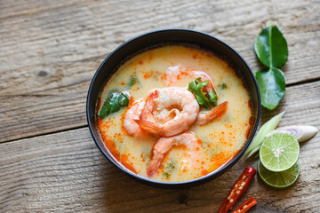 Traditional thai cuisine hot spicy soup shrimp curry with herb and spices Thai food, Shrimp soup bowl, seafood soup with shrimps prawns in the restaurant