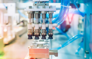 robotic pneumatic piston sucker unit on industrial machine,automation compressed air factory production