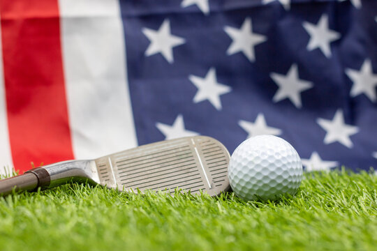 Golf ball is on flag of America background