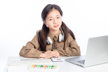 Little Asian girl receiving online education on white background