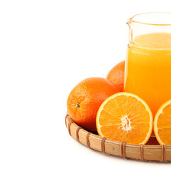 glass of orange juice and oranges