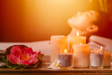 Beautiful women in beauty Spa salon calm relax resting with aroma scent candle for body healthcare...