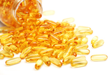 Vitamin Omega-3 fish oil capsules on white background 