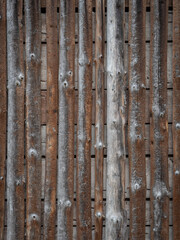 Wooden wall from the logs of a barn