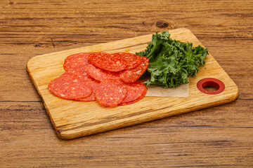 Italian spycy pepperoni sausage slices