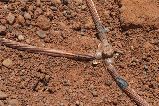 Welding copper ground wire on ground rod.Welding copper ground wire.Connect copper grounding lightning protection system. With the melting