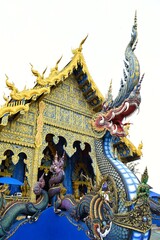 Fototapeta na wymiar Chiang Rai Blue Temple or Wat Rong Seua Ten, Blue color represents the Dharma, the Lord Buddha virtue code of moral that spread all over the world.
