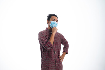 health, pandemic and safety concept - asian young man wearing face protective medical mask for protection from virus disease over white background