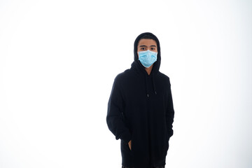 health, pandemic and safety concept - asian young man wearing face protective medical mask for protection from virus disease over white background
