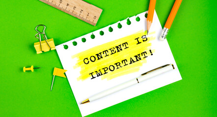 Text CONTENT IS IMPORTANT sign showing on green background with office tools