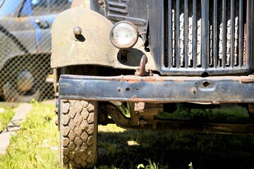 Fototapeta na wymiar old rusty truck in sun light