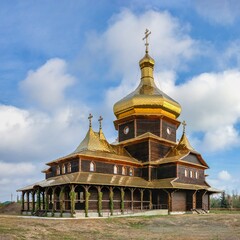 Fototapeta na wymiar Wooden church in Sergeevka resort, Ukraine