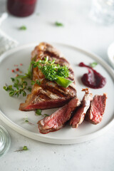 Grilled beef steak with herbs