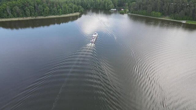Top view of cruise ships on the Necko lake.Landscape from a drone on lakes Necko and Rospuda