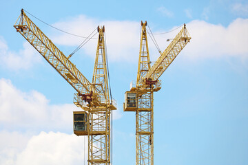 Fototapeta na wymiar tower cranes on a construction site 
