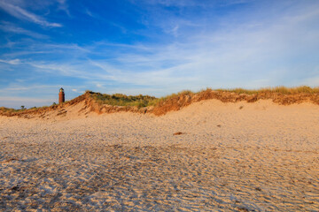 An den Dünen mit Leuchtturm