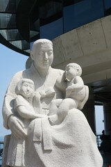 The statue of a Korean woman holding her kids to wait for the return of her husband